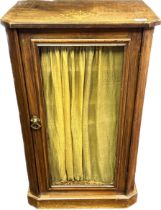 Edwardian music cabinet. Inlaid top section, glass panelled door with key. [85x51x35cm]