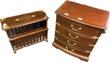 Heavy but small rosewood chest of four drawers with brass inlays. Together with a Rosewood and brass