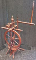 Antique miniature spinning wheel. [79cm- high]