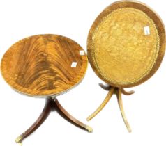 Two reproduction wine tables; mustard leather oval top with flip top action.