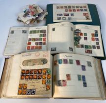 A collection of mixed world stamps albums
