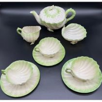 Antique Belleek shell design tea pot, sugar bowl, cream jug, three cups and three saucers. All with