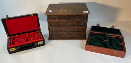 An antique watch makers chest along with 2 antique leather bound cases with fitted interiors [