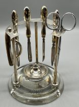 1930's Birmingham silver and glass manicure set display stand. Produced by Fred H Adams & Co.