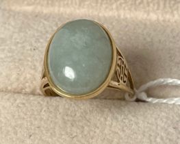 14ct yellow gold ring set with a jade cabochon gem stone. [Ring size N] [4.78Grams]