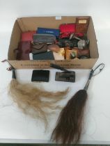 A box of collectable items; vintage desk stamper, desk tidy & vintage swatters