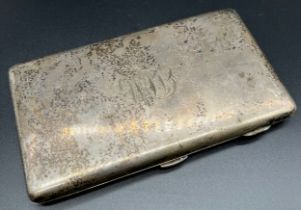 A Sheffield silver cigarette case, contains original cigarettes. Produced by Walker & Hall. [15x9cm]