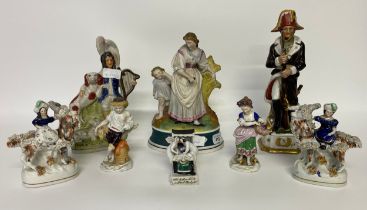 A collection of Staffordshire pottery flat back figures, Chelsea porcelain figures along with