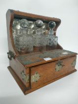 A 19th century Tantalus with fitted 3 section decanter set [34x36X26.5cm]