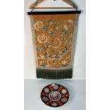 A Vintage Chinese silk wall hanging tapestry depicting floral and bird design along with a