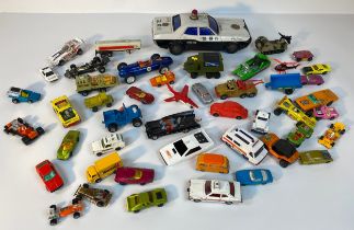 A collection of play worn vehicle's; A Large tin plate police car, Corgi 007 Lotus, 1960s Corgi