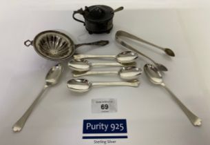 A Selection of silver items; Silver condiment pot, liner and spoon, Sterling silver tea strainer and