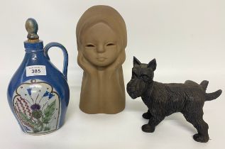 A Buchan pottery pre 1972 flagon, a Scottish Scottie cast iron dog door stop along with a 1960s