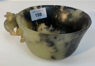 A Chinese jade pale green/ black cup with animal handle [15cm]