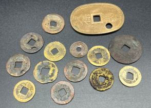 A Collection of old Chinese coins and tokens.