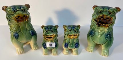 A Collection of four Chinese drip glazed Foo dogs figures [21cm]