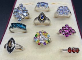 A Lot of Nine 925 silver and gem stone rings; Garnet, tourmaline, Sapphire and Quartz.