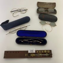 Antique Sovereign Balance Scales and a collection of antique spectacle's with cases to include 9ct