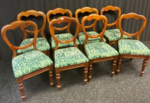 A set of eight Victorian balloon back chairs