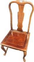 Rosewood chair, the shaped back with central splat, raised o cabriole legs ending in paw feet