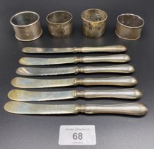 A Lot of silver items; A Lot of four silver napkin rings and a set of six Sheffield silver handle