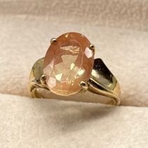 9ct yellow gold ring set with an oval cut gem stone. [Ring size N] [3.65grams]