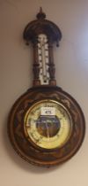 Antique German Lufft dark carved Aneriod Berometer with ceramic thermomter scale.