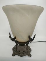 A bronze based table lamp with phoenix design fitted with a glass shade [34.5cm]