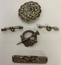 Four Silver brooches and one other; Plated Victorian thistle design brooch, Glasgow silver ornate