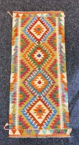 A Chobi Kilim hand woven hall runner [146x64cm]