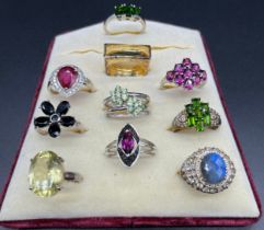 A Lot of 10 925 silver rings fitted with various gem stones; Ruby, Citrine and tourmaline stones.