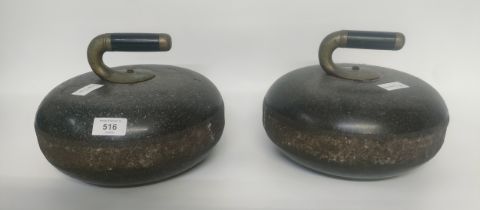 A Pair of 20th century antique curling stones set in granite with fitted brass & wood handles