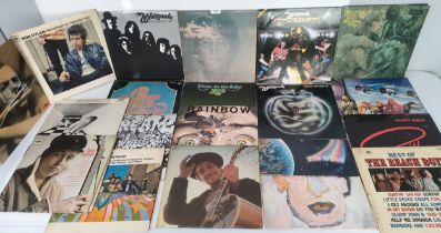 A collection of LP records; John Lennon, Rainbow, the beach boys & Bob dylan