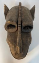 An antique African carved animal mask [48x27cm]