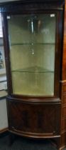 19th century mahogany bow front corner cabinet. [184x71x41cm]