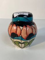 A Moorcroft pottery ginger jar and cover, tulip pattern Signed EB to base [10cm]