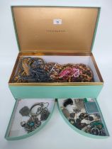 A Box containing a large quantity of mixed jewellery.