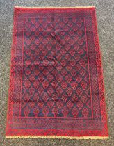 A Baluchi hand woven rug [143x98cm]