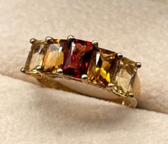 9ct yellow gold ring set with garnet and citrine gem stones. [Ring size M] [3.03Grams]