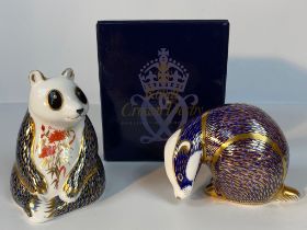 A Royal crown derby panda paperweight along with badger paperweight