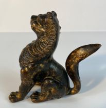 Antique Chinese bronze foo dog figure stamped MMA to the underside. [11cm High]