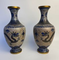Pair of Cloisonne vases of bulbous form, decorated with dragons chasing flaming pearls amongst