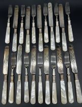 Twenty Piece silver plate and mother of pearl handle fork and knives set.