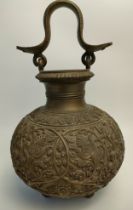 A 19th century Burmese vase with snake design handle set with Indian god scene supported on bun feet