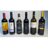 Six bottles of wine from various dates; Caliente Rojo, French Connection reserve Merlot, Chateau