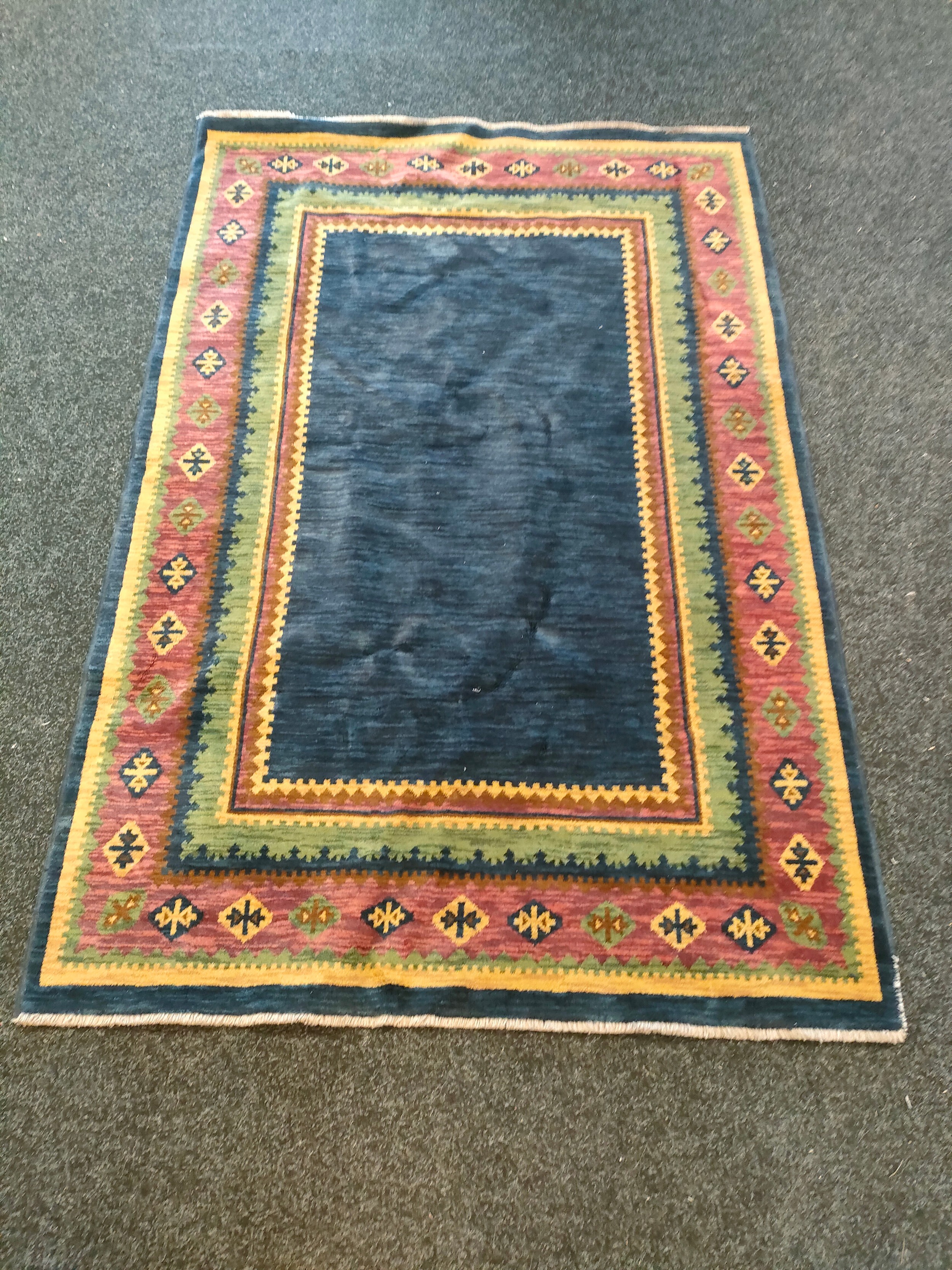 A Hand Knotted Gabbeh Turkish Rug set with a blue centre & Turkish border pattern [233.5x135cm]
