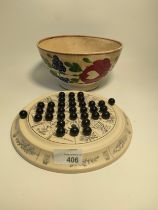 An antique Scottish pottery hand painted bowl in flower design along with vintage solitaire game