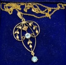 9ct yellow gold Edwardian pendant fitted with two round cut blue stones, together with a 9ct