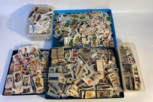 A large collection of cigarettes cards; celebrities, train & car cards