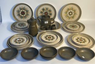 A Selection of mid century studio pottery dinner ware; Langley dinner service in flower design &